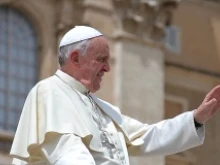 Pope Francis greets pilgrims in St. Peter's Square after the Wednesday general audience, May 7, 2014. 