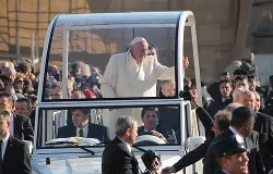 Pope Francis greets pilgrims in St. Peter's Square before the Wednesday general audience Dec. 11, 2013. ?w=200&h=150