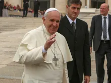 Pope Francis greets pilgrims in St. Peter's Square before the Wednesday general audience on Oct. 29, 2014. 