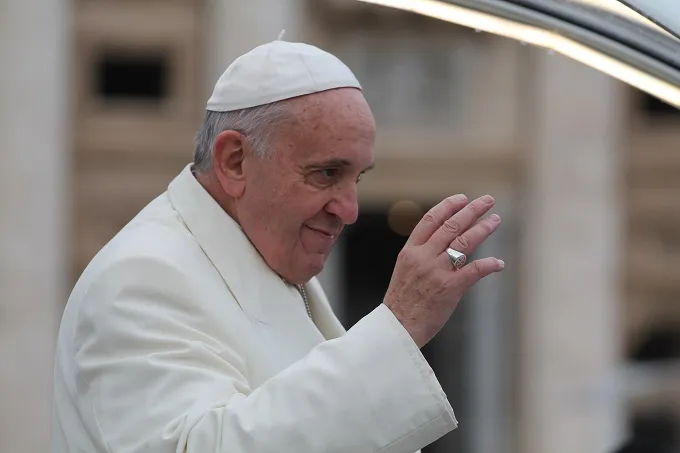 Pope Francis greets pilgrims in St. Peter's Square during his Dec. 3, 2014 general audience. ?w=200&h=150