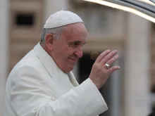 Pope Francis greets pilgrims in St. Peter's Square during his Dec. 3, 2014 general audience. 