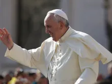 Pope Francis greets pilgrims in St. Peter's Square during his Sept. 9, 2015 general audience. 