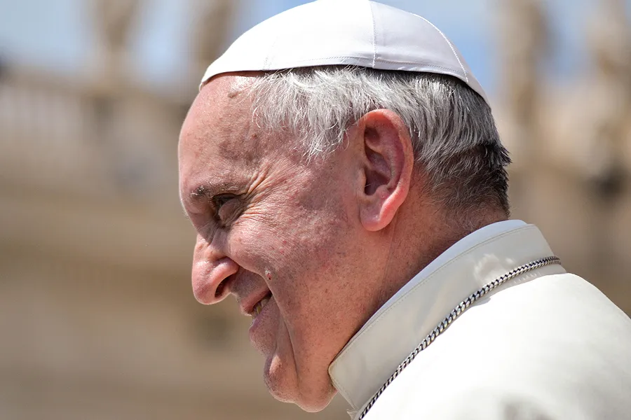 Pope Francis greets pilgrims in St. Peter's Square during his Wednesday general audience on June 18, 2014. ?w=200&h=150
