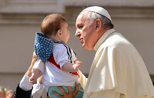 Pope Francis greets pilgrims in St. Peter's Square during his Wednesday general audience on June 18, 2014. ?w=200&h=150