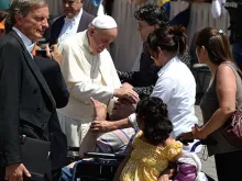 Pope Francis greets pilgrims in St. Peter's Square during the Wednesday General Audience, May 14, 2014. 