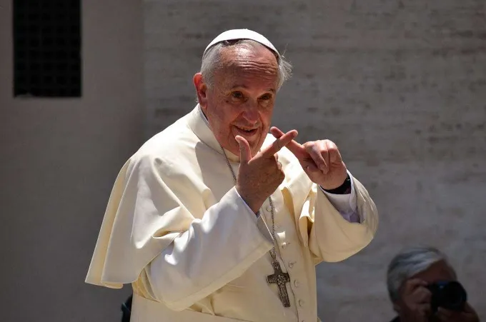 Pope Francis greets pilgrims in St. Peter's Square during the Wednesday general audience on May 21, 2014. ?w=200&h=150
