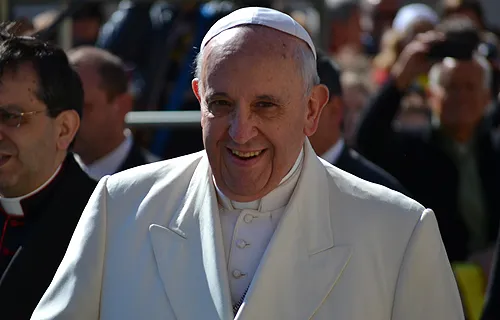 Pope Francis greets pilgrims in St. Peter's Square before the Wed. general audience on April 16, 2014. ?w=200&h=150