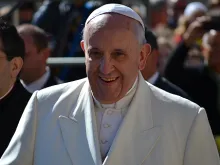 Pope Francis greets pilgrims in St. Peter's Square before the Wed. general audience on April 16, 2014. 