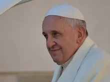 Pope Francis greets pilgrims in St. Peter's Square during the Wednesday general audience on April 16, 2014 