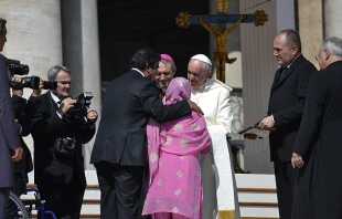 Pope Francis greets Paul Bhatti and his mother in St. Peter's Square during the Wednesday general audience on Aug. 27, 2014.   Daniel Ibáñez/CNA.