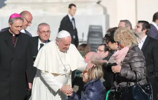 Pope Francis greets pilgrims in St. Peter's Square, Dec. 17, 2014.   Bohumil Petrik/CNA.