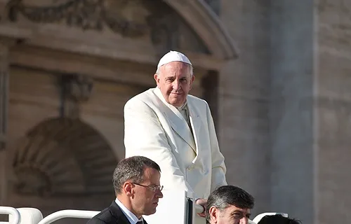 Pope Francis greets pilgrims in St. Peter's Square during the Wednesday general audience on Dec. 4, 2013. ?w=200&h=150