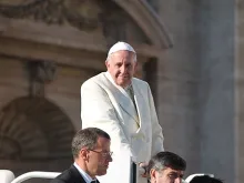 Pope Francis greets pilgrims in St. Peter's Square during the Wednesday general audience on Dec. 4, 2013. 