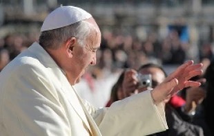 Pope Francis greets pilgrims in St. Peter's Square before the Wednesday general audience Dec. 4, 2013.   Kyle Burkhart/CNA.