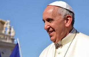 Pope Francis greets pilgrims in St. Peter's Square for the Italian Sporting Center's celebration of sports June 7, 2014.