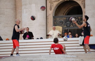 Pope Francis greets pilgrims in St. Peter's Square for the Italian Sporting Center's celebration of sports on June 7, 2014.   Daniel Ibanez/CNA