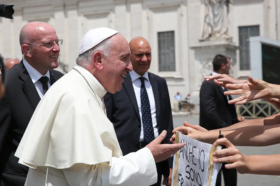 Pope Francis greets pilgrims in St. Peter's Square for the Wednesday general audience on June 17, 2015. ?w=200&h=150