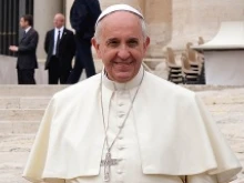 Pope Francis greets pilgrims in St. Peter's Square at the General Audience held June 25, 2014. 