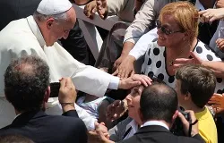 Pope Francis greets the crowd at Castel Gandolfo before the Sunday Angelus on July 14, 2013. ?w=200&h=150