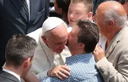Pope Francis greets the crowd at Castel Gandolfo before the Angelus, July 14, 2013. ?w=200&h=150