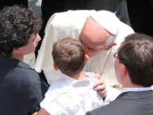 Pope Francis greets the crowd at Castel Gandolfo before the Sunday Angelus on July 14, 2013. 