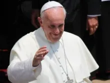 Pope Francis greets crowds at Castel Gandolfo, July 14, 2013. 