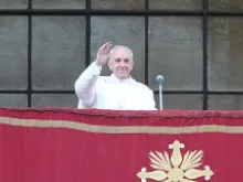 Pope Francis greets the faithful from the loggia of St. John Lateran Basilica on April 7, 2013. 