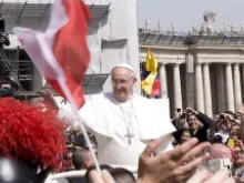 Pope Francis greets the faithful in St. Peter's Square for Palm Sunday on March 24, 2013. 