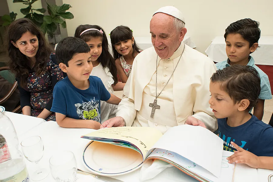 Pope Francis hosts a lunch with Syrian refugees at his residence in Vatican City, Aug. 11, 2016. ?w=200&h=150