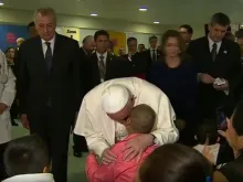 Pope Francis hugs a child at Mexico City's Federico Gomez Pediatric Hospital Feb. 14. 