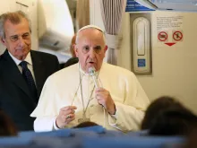 Pope Francis speaks with journalists aboard the plane from Manila to Rome, Jan. 19, 2015. 