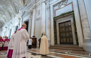 Pope Francis before the Holy Door of St. Peter's Basilica during the convocation of the Jubilee of Mercy, April 11, 2015.   L'Osservatore Romano.