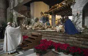 Pope Francis incenses the Nativity Scene in St. Peter's Basilica Dec. 24, 2017.   Vatican Media.