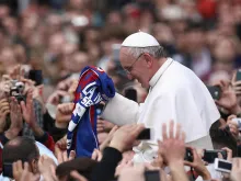 Pope Francis is given a San Lorenzo's jersey in St. Peter's Square on March 31, 2013. 