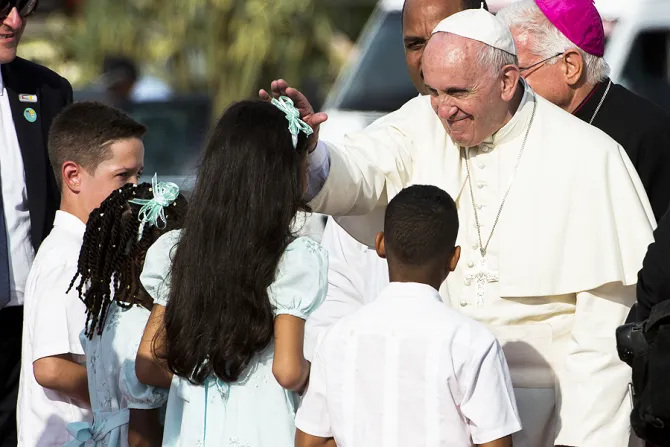 Pope Francis is greeted by children in Santiago de Cuba on Sept 22 2015 Credit LOsservatore Romano CNA 9 22 15