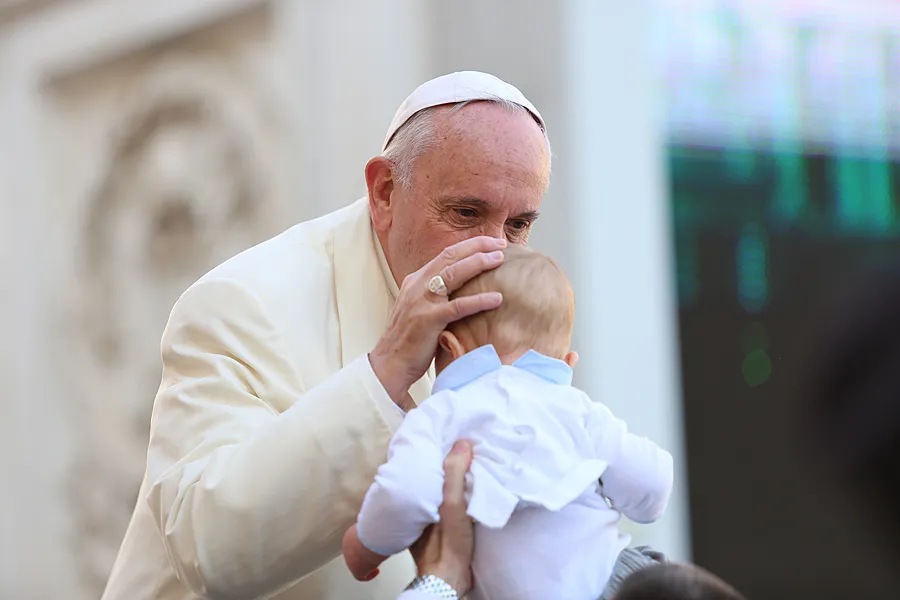 Pope Francis kisses a baby at the general audience in St. Peter's Square, Nov. 11, 2015. ?w=200&h=150