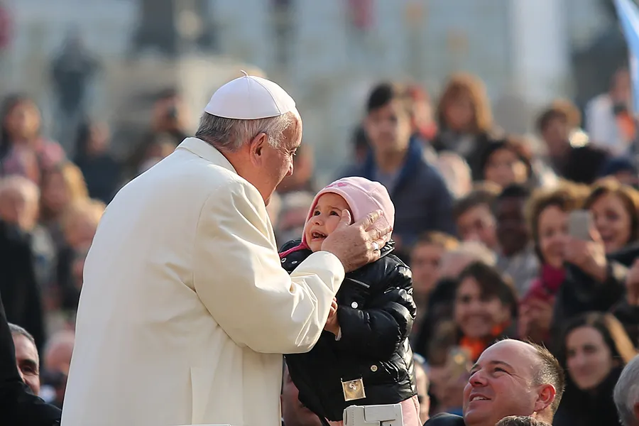 Pope francis kisses a child in St. Peter's Square for the general audience Dec. 9, 2015. ?w=200&h=150