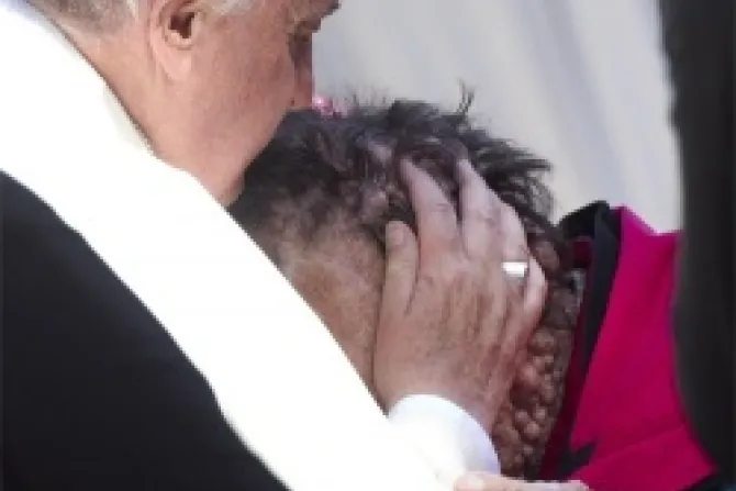 Pope Francis kisses a man suffering from boils in Saint Peters Square at the end of his Wednesday general audience Nov 6 2013 Credit ANSA CLAUDIO PERI CNA 11 6 13