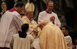 Pope Francis lays his hands on Bishop Fernando Vergez during his episcopal ordination in St. Peter's Basilica on Nov. 15, 2013 ?w=200&h=150