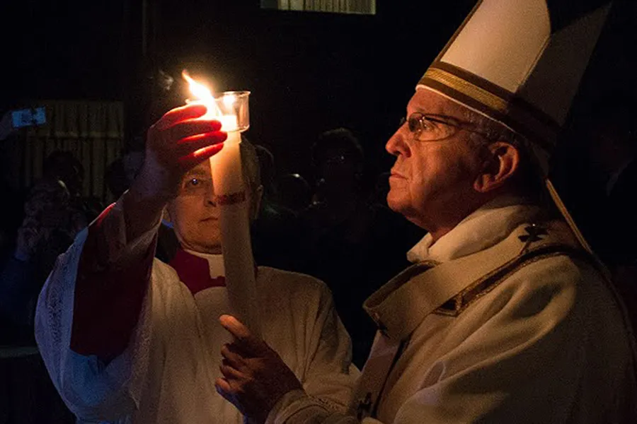 Pope Francis lighting the Easter candle before the entrance procession of the Easter Vigil Mass in St. Peter's Basilica on April 4, 2015. ?w=200&h=150