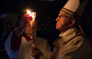 Pope Francis lighting the Easter candle, Easter Vigil 2015.   Vatican Media