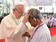 Pope Francis listens to testimonies during a meeting with priests, religious and seminarians in Dhaka, Bangladesh Dec. 2, 2017. 