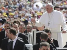 Pope Francis makes his way through St. Peter's Square in the popemobile during the May 8, 2013 general audience. 