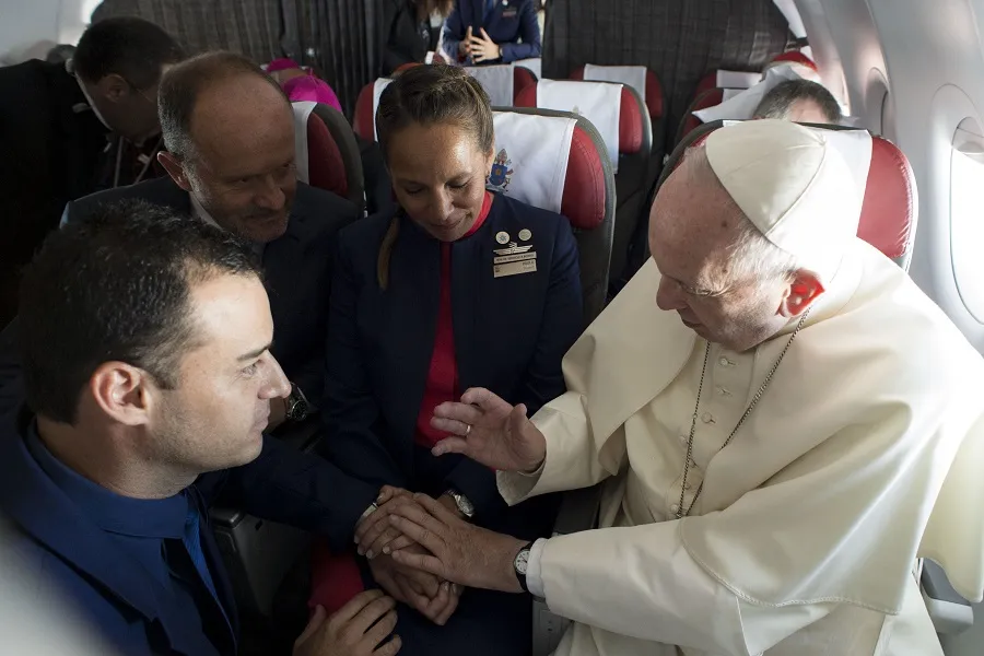 Pope Francis marries flight attendants Paula Podest and Carlos Ciuffardi during his flight from Santiago to Iquique Jan. 18, 2018. ?w=200&h=150