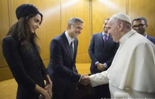 Pope Francis meets George and Amal Clooney at the Vatican May 29, 2016.   L'Osservatore Romano.