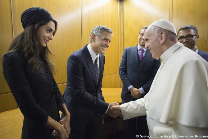 Pope Francis meets George and Amal Clooney at the Vatican May 29 2016 Credit LOsservatore Romano CNA