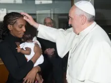 Pope Francis meets Meriam Ibrahim and her child Maya at the Vatican's Santa Marta residence, July 24, 2014. 