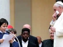 Pope Francis meets children of Rome's Sacred Heart of Jesus at the Praetorian Barracks parish, Jan. 19, 2014. 