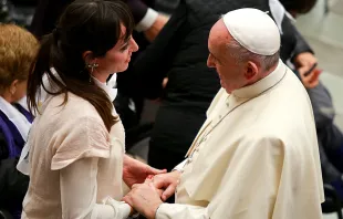 Pope Francis meets with a woman at the general audience in Paul VI Hall on Jan. 13, 2016.   Daniel Ibanez/CNA.