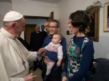 Pope Francis meets former priests and their families at an apartment in Rome's Ponte di Nona neighborhood as his last Mercy Friday initiative, Nov. 11, 2016. 